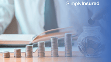 Growing stacks of coins leading up to a jar of coins